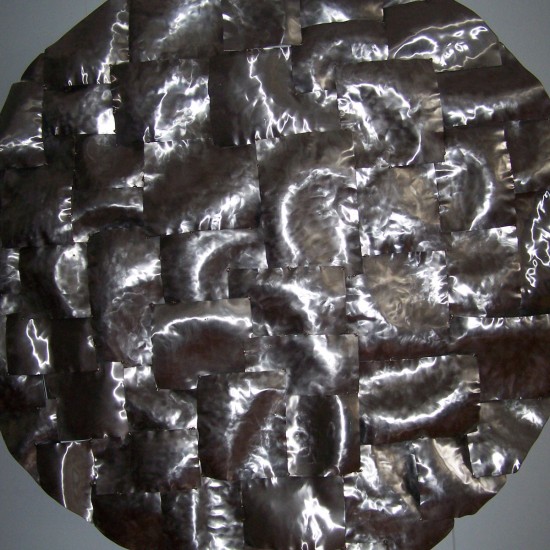 Helidon Xhixha.ferro e acciao.diametro cm.. 200. essposta fuori catalogo presso la mostra "energie" al Museo Magi900, maggio 2010
